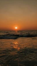 The sun setting into the sea off Laxmanpur Beach, Neil Island